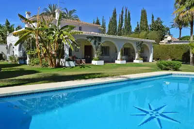 Holiday villa with lovely pool area, 300m from the beach in Atalaya Playa