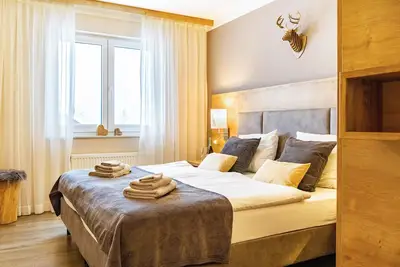 Image de Appartement 'Schwarzwaldschick' directement sur la piste de ski, avec vue sur la montagne