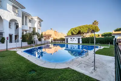 Image de Appartement de vacances \"Casa Amparo Sancti Petri\" avec piscine partagée, terrasse privée et Wi-Fi