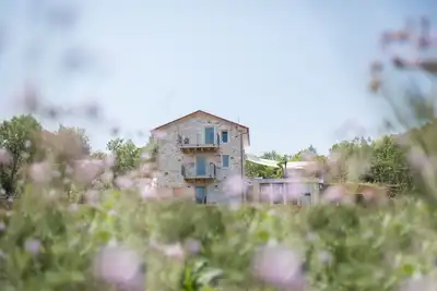 Image de Breath in the true Istrian feel in this romantic, new, stone villa with pool.