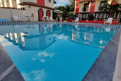 Image de A 80m Praia de Taperapuã, c/ Piscina, Sauna, net Privativa 300mbps e Portaria