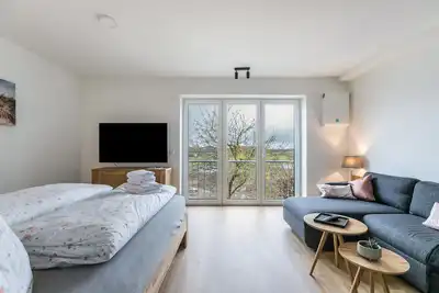 Image de Appartement \"Husbyries 11\" avec jardin partagé et Wi-Fi