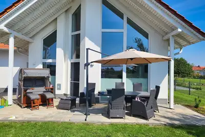 Image de Modernes Ferienhaus mit Kamin, Garten und Eigener Sauna - Ferienhaus Meerfreude