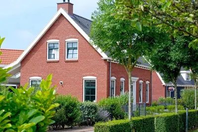 Image de Luxury detached villa for 10 people with sauna and whirlpool in a small-scale park on the Zeeland coast