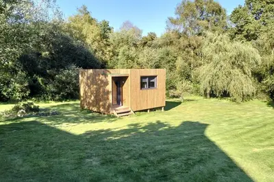 Image de Cottage bois au milieu de notre jardin arboré de 2000 m2